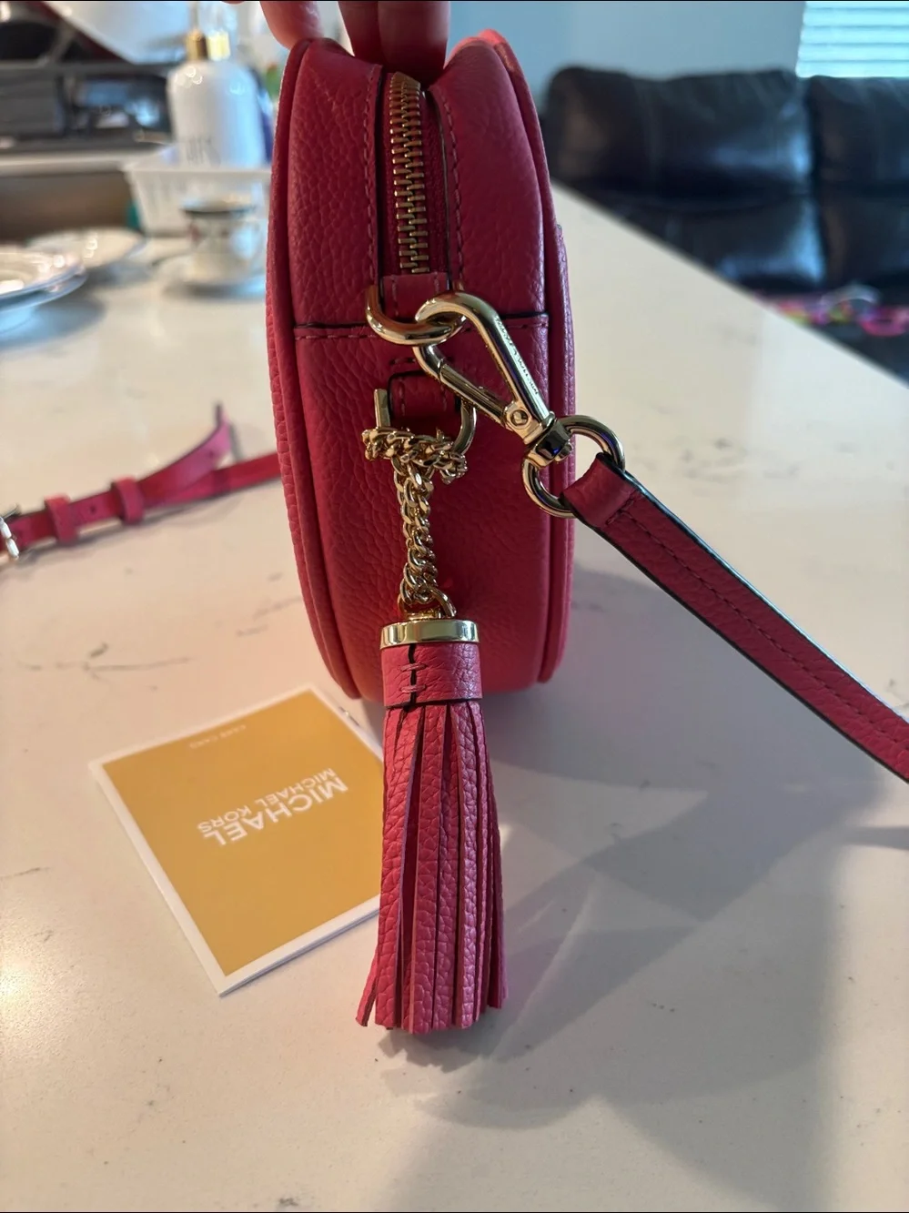 NWOT Michael Kors Coral Pink Round Crossbody Bag with Tassel